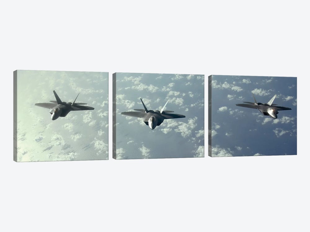 A Three-Ship Formation Of F-22 Raptors Fly Over The Pacific Ocean by Stocktrek Images 3-piece Canvas Wall Art