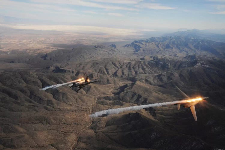 A Two-Ship Of B-1B Lancers Release Chaff And Flares While Maneuvering Over New Mexico