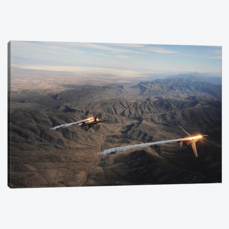 A Two-Ship Of B-1B Lancers Release Chaff And Flares While Maneuvering Over New Mexico Canvas Print #TRK612} by Stocktrek Images Canvas Art