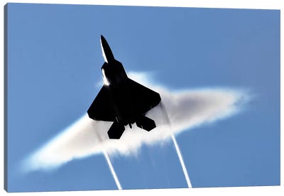 A US Air Force F-22 Raptor Aircraft Executing A Supersonic Flyby Canvas Art Print - Air Force