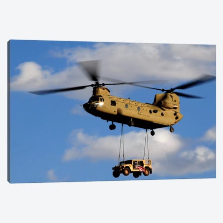 A US Army CH-47 Chinook Helicopter Transports A Humvee Canvas Print #TRK628} by Stocktrek Images Canvas Art Print