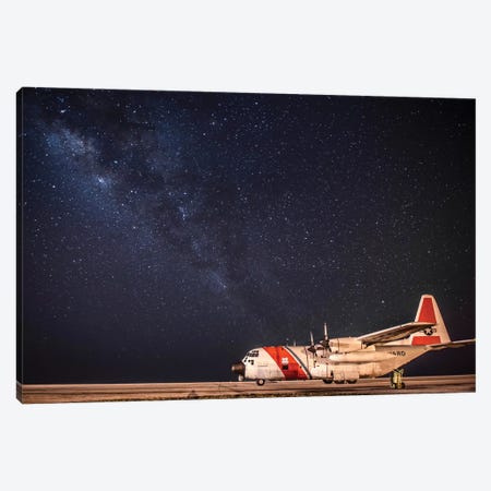 A US Coast Guard C-130 Hercules Parked On The Tarmac On A Starry Night Canvas Print #TRK632} by Stocktrek Images Canvas Artwork