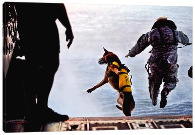 A US Soldier And His Military Working Dog Jump Off The Ramp Of A CH-47 Chinook Canvas Art Print - Soldier Art