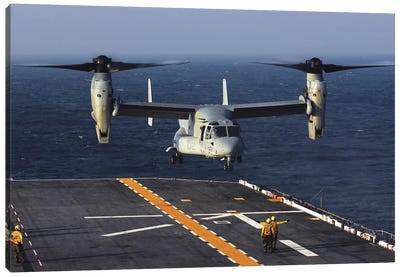 A V-22 Osprey Aircraft Prepares To Land Aboard The USS Bataan In The Atlantic Ocean Canvas Art Print - Aircraft Carriers