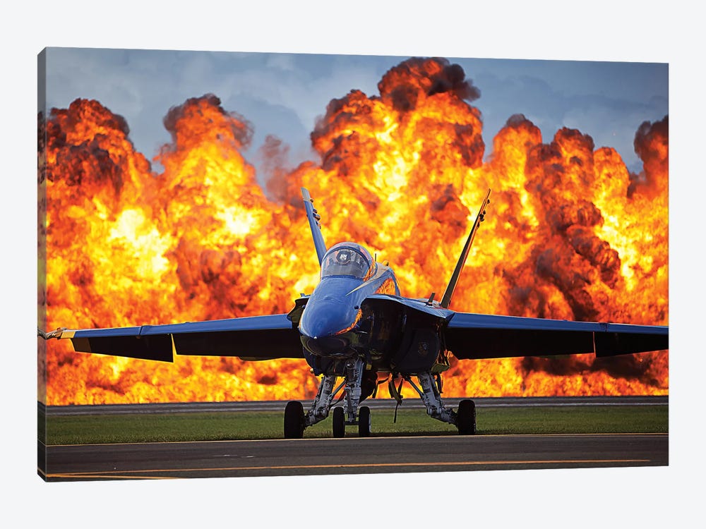 A Wall Of Fire Erupts Behind A US Navy F/A-18 Hornet Aircraft by Stocktrek Images 1-piece Canvas Artwork