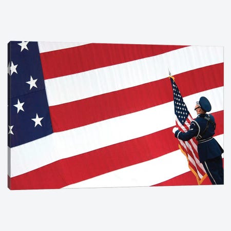 Airman Posts The American Flag During A Change Of Command Ceremony Canvas Print #TRK666} by Stocktrek Images Canvas Wall Art