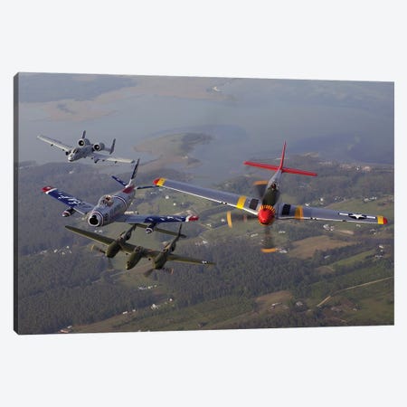 An A-10 Thunderbolt, F-86 Sabre, P-38 Lightning And P-51 Mustang In Flight Canvas Print #TRK675} by Stocktrek Images Canvas Print