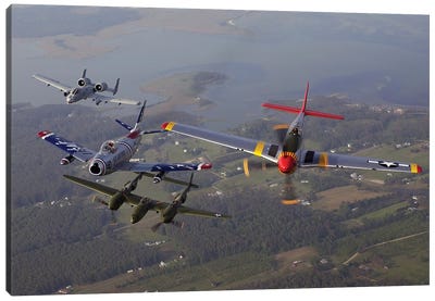 An A-10 Thunderbolt, F-86 Sabre, P-38 Lightning And P-51 Mustang In Flight Canvas Art Print - Veterans Day