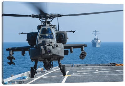 An Army Ah-64D Apache Helicopter Takes Off From USS Ponce Canvas Art Print - Helicopter Art