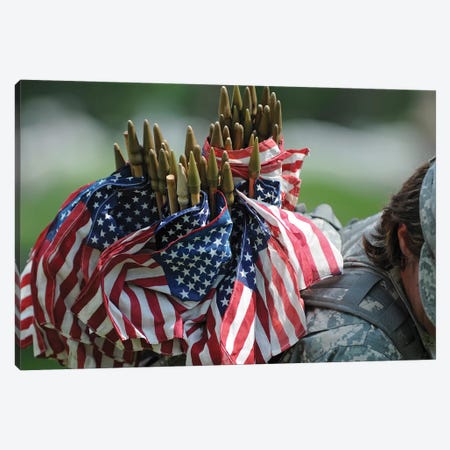 An Army Soldier's Backpack Overflows With Small American Flags Canvas Print #TRK685} by Stocktrek Images Canvas Wall Art