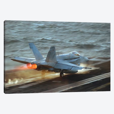 An F/A-18C Hornet Launches From The Flight Deck Of USS Theodore Roosevelt Canvas Print #TRK705} by Stocktrek Images Canvas Art Print