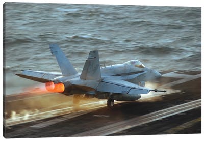 An F/A-18C Hornet Launches From The Flight Deck Of USS Theodore Roosevelt Canvas Art Print - Aircraft Carriers