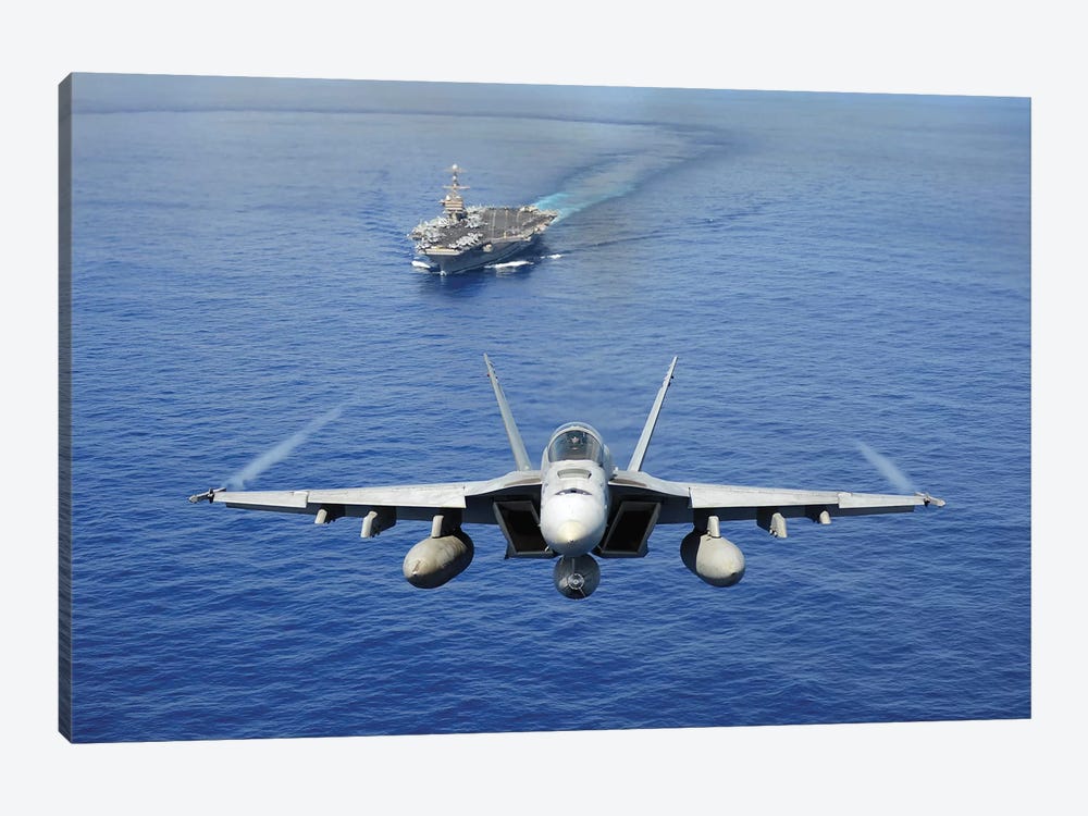 An F/A-18E Super Hornet Flying Above USS John C. Stennis by Stocktrek Images 1-piece Canvas Art