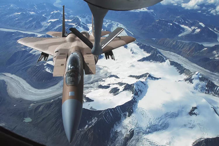 An F-15C Eagle Aircraft Sits Behind A KC-135R Stratotanker