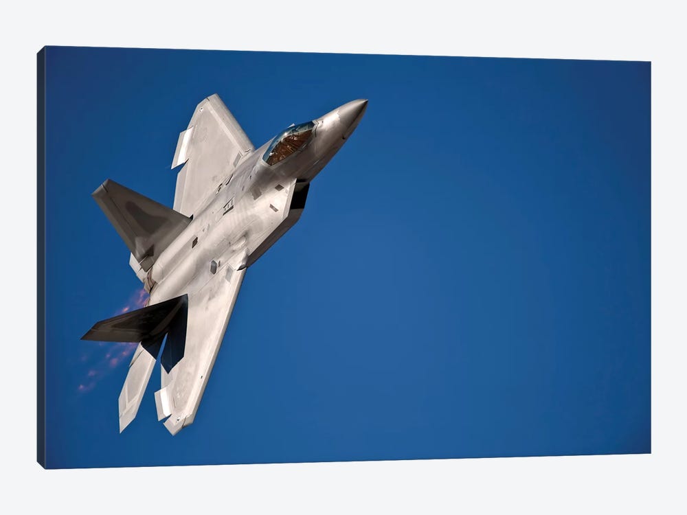 An F-22 Raptor Aircraft Performs During Aviation Nation 2010 by Stocktrek Images 1-piece Canvas Print