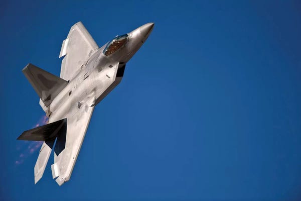Military Aircraft: An F-22 Raptor Aircraft Performs During Aviation Nation 2010 by Stocktrek Images
