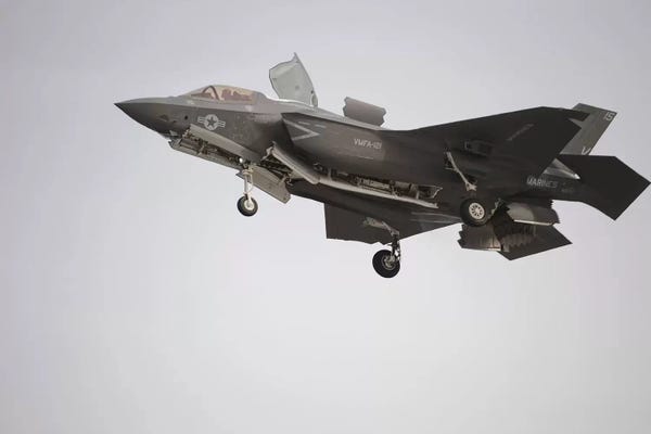 An F-35B Lightning II Joint Strike Fighter Prepares To Make A Vertical Landing