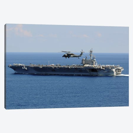 An MH-60S Seahawk Helicopter Flies Over USS George H.W. Bush Canvas Print #TRK753} by Stocktrek Images Art Print
