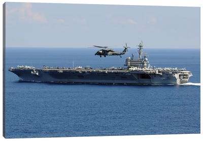 An MH-60S Seahawk Helicopter Flies Over USS George H.W. Bush Canvas Art Print - Aircraft Carrier Art
