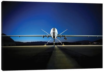 An MQ-9 Reaper Sits On The Flight line Canvas Art Print - Military Aircraft Art