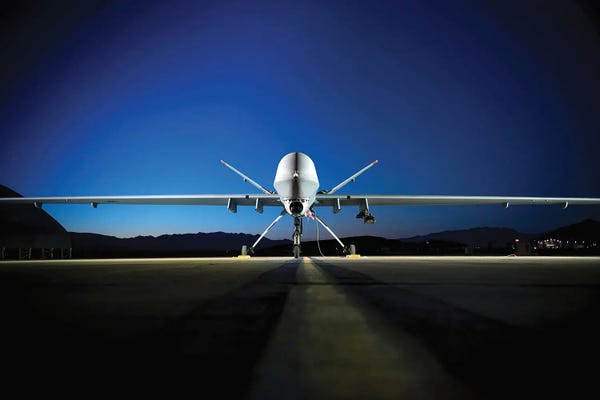By Air: An MQ-9 Reaper Sits On The Flight line by Stocktrek Images