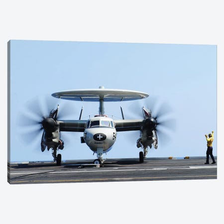 Aviation Boatswain's Mate Directs An E-2C Hawkeye On The Flight Deck Canvas Print #TRK766} by Stocktrek Images Canvas Art Print
