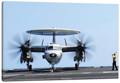 Aviation Boatswain's Mate Directs An E-2C Hawkeye On The Flight Deck Canvas Art Print - Aircraft Carriers