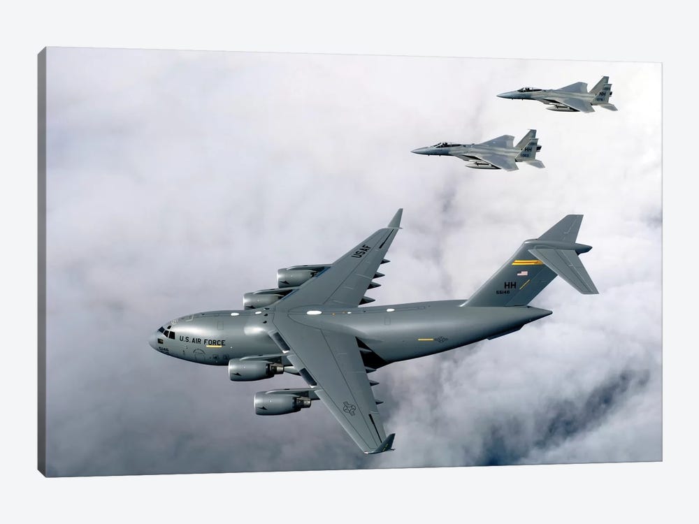 F-15B Eagles Escort The First Hawaii-Based C-17 Globemaster III To Its Home II by Stocktrek Images 1-piece Canvas Art Print