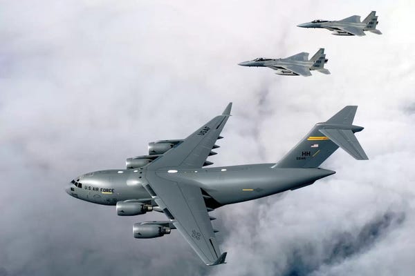 Stocktrek Images: F-15B Eagles Escort The First Hawaii-Based C-17 Globemaster III To Its Home II by Stocktrek Images