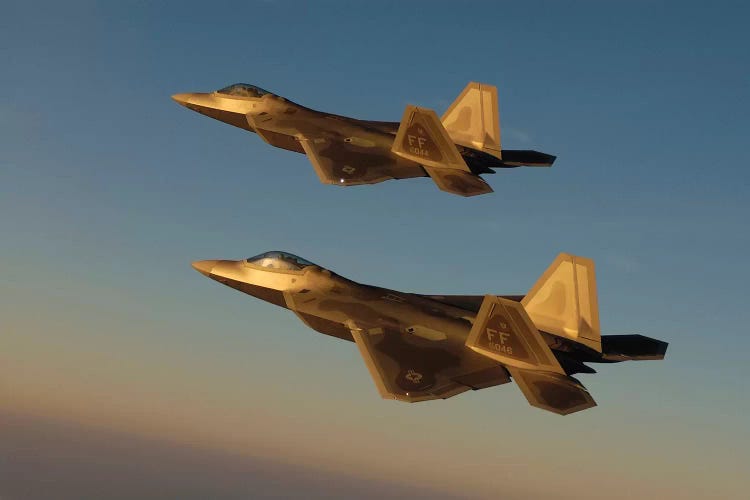 F-22A Raptors Fly Over Langley Air Force Base, Virginia by Stocktrek Images wall art