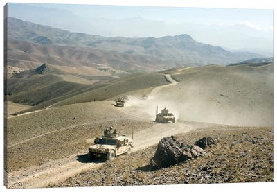 Humvees Traverse Rugged Mountain Roads Canvas Art Print - Military Vehicles