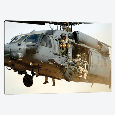 Pararescuemen Aboard A Helicopter Prepare For Landing Canvas Print #TRK872} by Stocktrek Images Canvas Wall Art