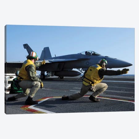Shooters Aboard The USS George HW Bush Give The Go-Ahead Signal To Launch An F/A-18 Super Hornet Canvas Print #TRK901} by Stocktrek Images Canvas Artwork