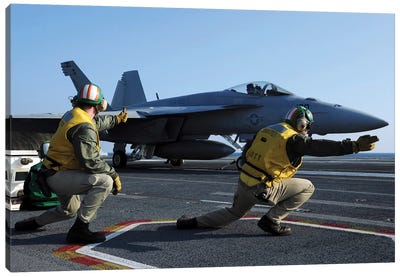 Shooters Aboard The USS George HW Bush Give The Go-Ahead Signal To Launch An F/A-18 Super Hornet Canvas Art Print - Aircraft Carriers