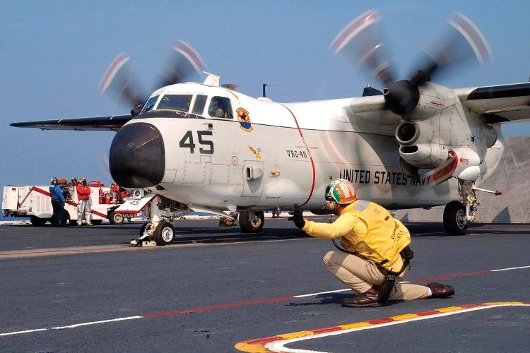 Signalman Gives The Launch Signal To A C-2A Greyhound