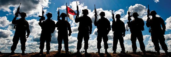 Stocktrek Images: Silhouette Of Soldiers From The US Army National Guard by Stocktrek Images