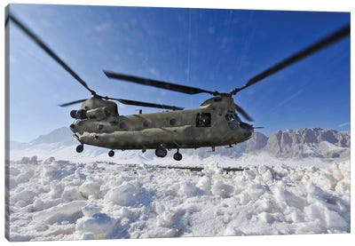 Snow Flies Up As A US Army CH-47 Chinook Helicopter Prepares To Land Canvas Art Print - Helicopter Art