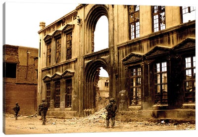 Soldiers Patrolling The Facade Of A Demolished Building In Baghdad, Iraq Canvas Art Print