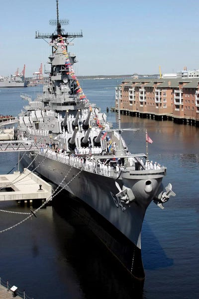 Navy: The Decommissioned US Navy Battleship, USS Wisconsin, Berthed To The Pier by Stocktrek Images