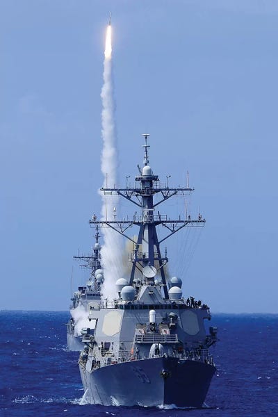 Warships: The Destroyer USS Benfold Fires A Surface-To-Air Missile Off The Coast Of Hawaii by Stocktrek Images