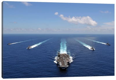 The USS Abraham Lincoln Leading A Formation Of Ships From The Abraham Lincoln Strike Group Canvas Art Print