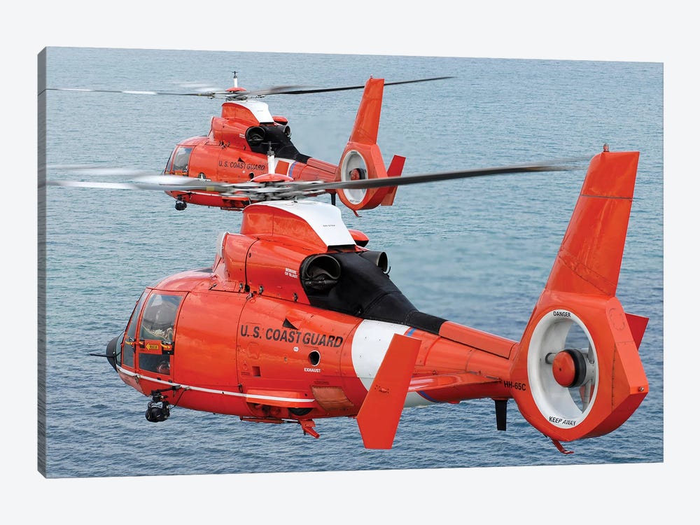 Two Coast Guard HH-65C Dolphin Helicopters Fly In Formation Over The Atlantic Ocean by Stocktrek Images 1-piece Canvas Print