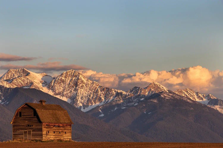 Old Wooden Barn With Mission Mountains Near Pablo, Montana, USA.