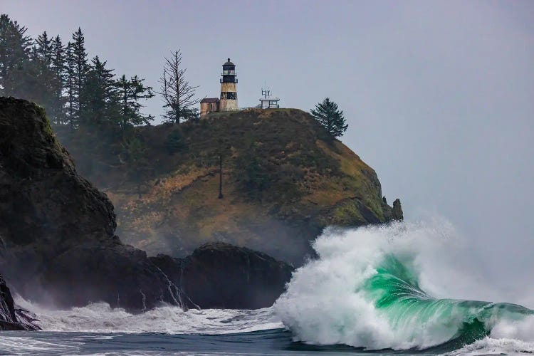 Waves Crash Below Lighthouse At Cape Disappointment State Park, Washington State, USA.