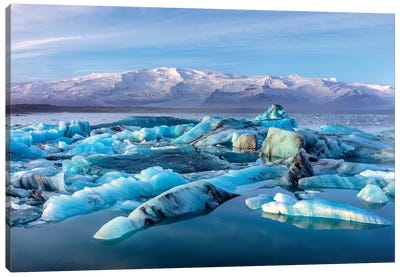 Calving icebergs in Jokulsarlon Glacier Lagoon in south Iceland Canvas Art Print - Chuck Haney
