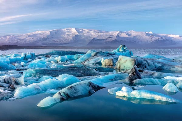 Iceland: Calving icebergs in Jokulsarlon Glacier Lagoon in south Iceland by Chuck Haney
