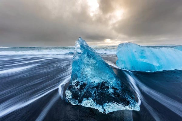 Iceland: Diamond ice chards from calving icebergs on black sand beach, Jokulsarlon, south Iceland III by Chuck Haney