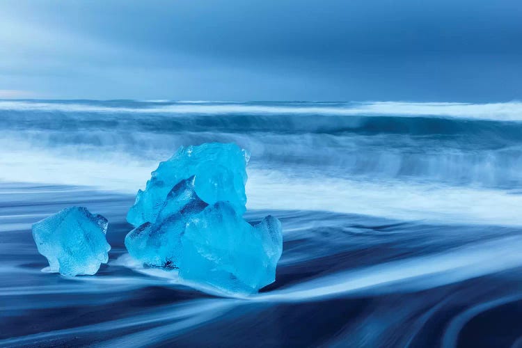 Diamond ice chards from calving icebergs on black sand beach, Jokulsarlon, south Iceland V