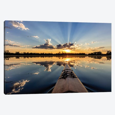 Kayaking into sunset rays on McWennger Slough, Kalispell, Montana, USA Canvas Print #UCK41} by Chuck Haney Canvas Artwork