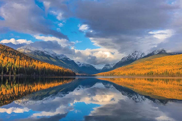 Mountain peaks reflect into Bowman Lake in autumn, Glacier National Park, Montana, USA II